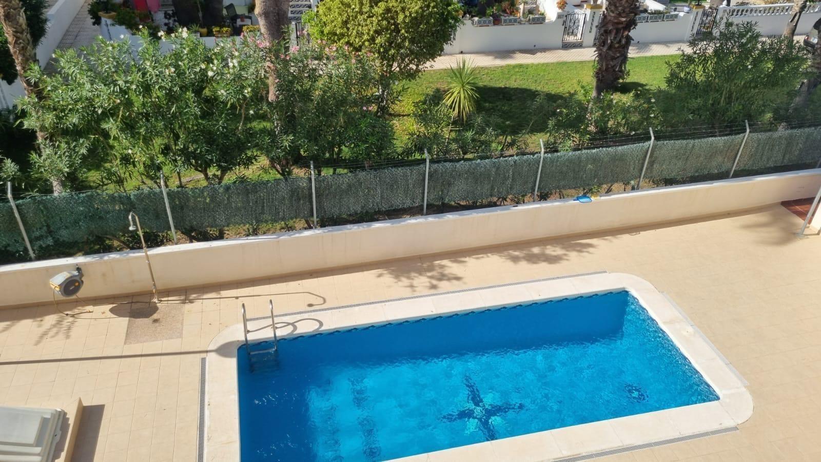 We are delighted to present this semi-detached triplex in Villamartín, Orihuela Costa, located in a - Image 1
